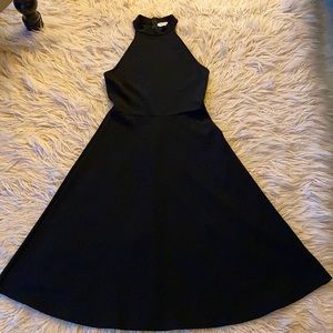 Black sleeveless fit and flare  The Vanity Room dress sz s